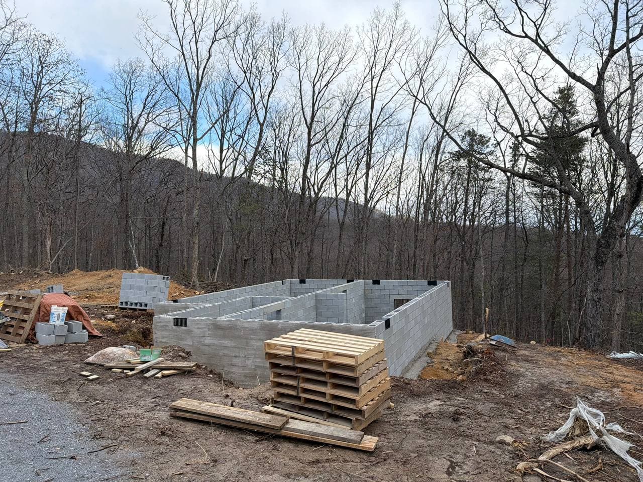 The Stag's foundation on the hillside lot